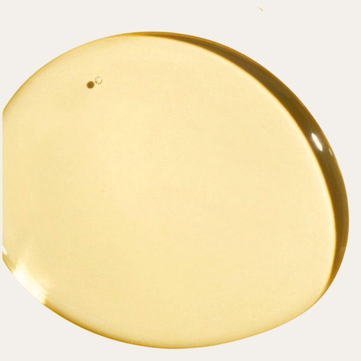 Close-up of marula oil texture showing smooth, lightweight, fast-absorbing facial oil