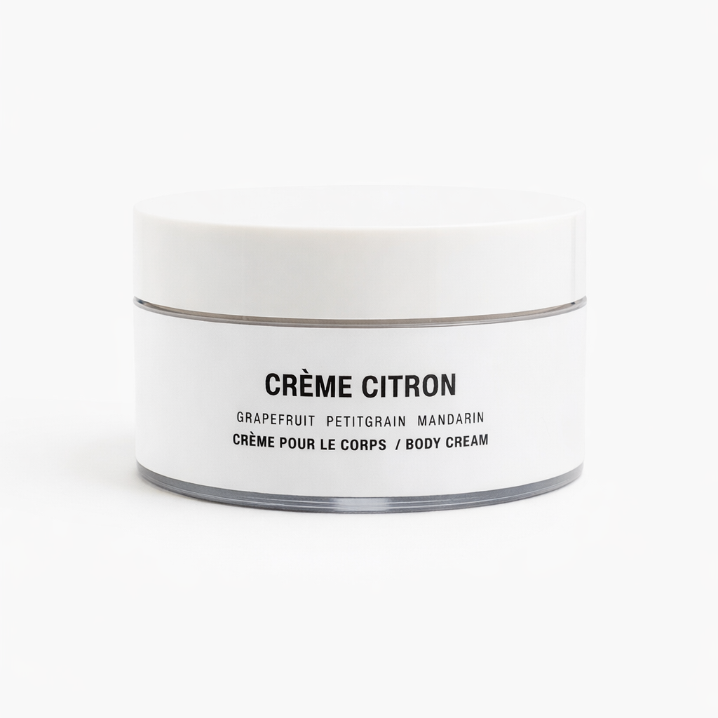 White jar of Crème Citron body cream on a white background