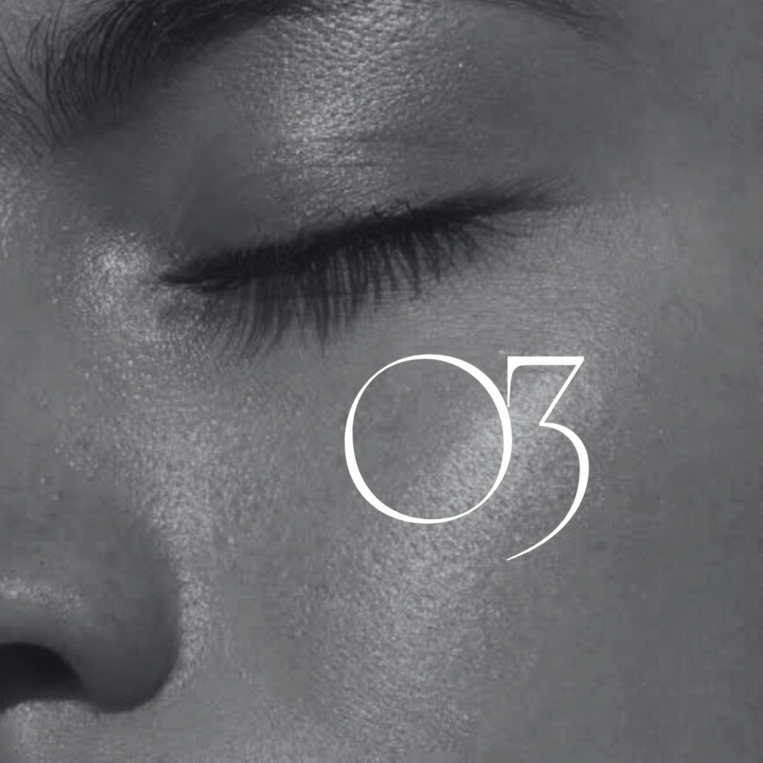 Close-up of a person’s face with the number 03 overlaid in white.