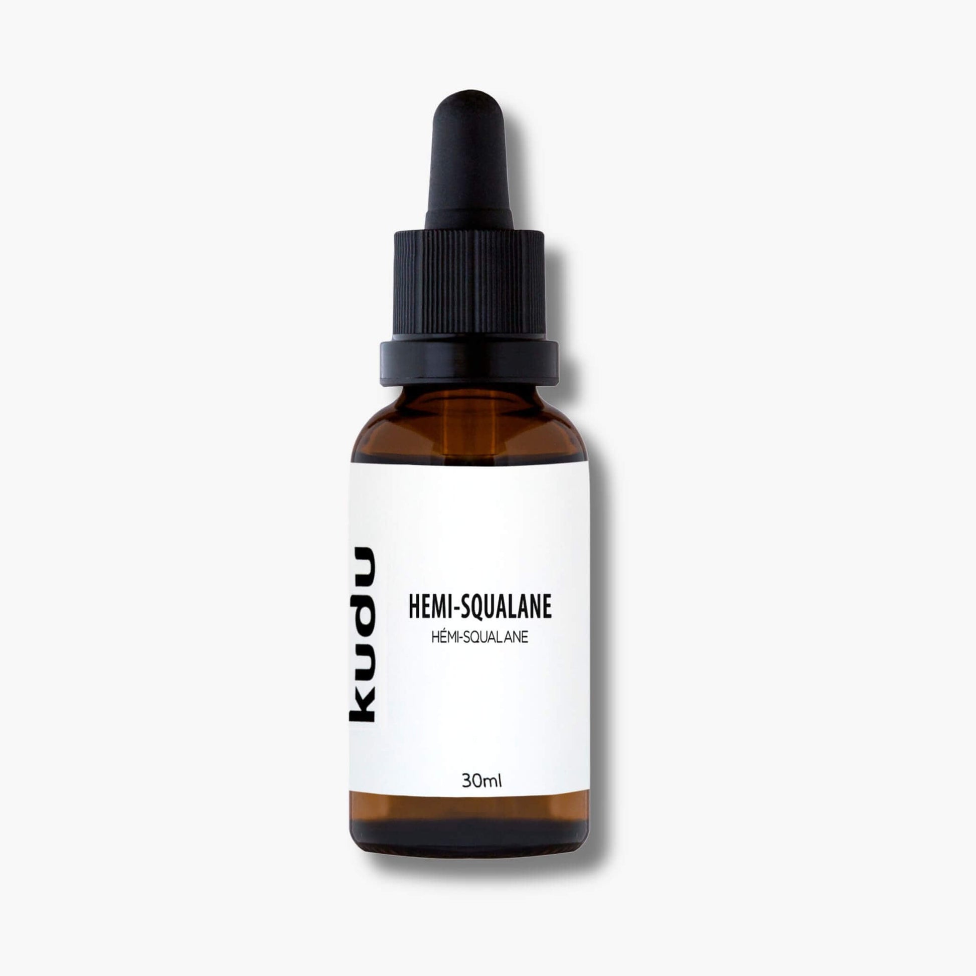 A dropper bottle of Kudu Cosmetica Hemi Squalane on a plain bbackground.