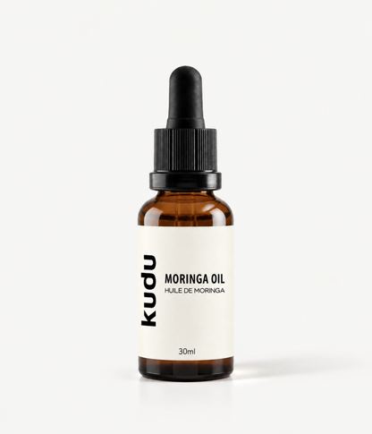 A 30ml amber glass dropper bottle of Kudu Moringa Oil with a black dropper cap and a minimalist off-white label, set against a clean white background.