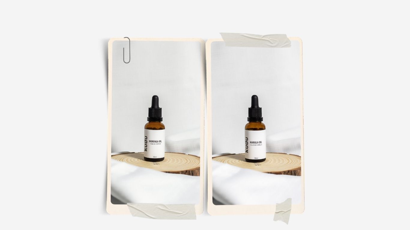 Two bottles with droppers on a wooden shelf against a white background